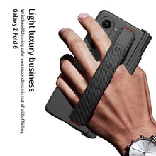 Load image into Gallery viewer, Magnetic Hinge Pen Box Shockproof Phone Case With Screen Protector &amp; Wristband For Samsung Galaxy Z Fold6
